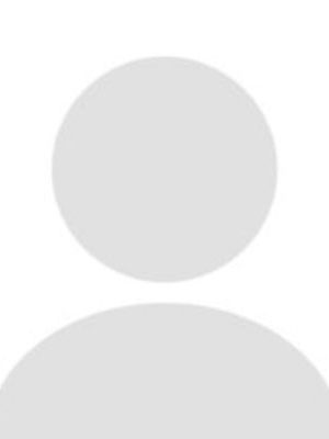 Generic gray user avatar silhouette with circular head and shoulders.